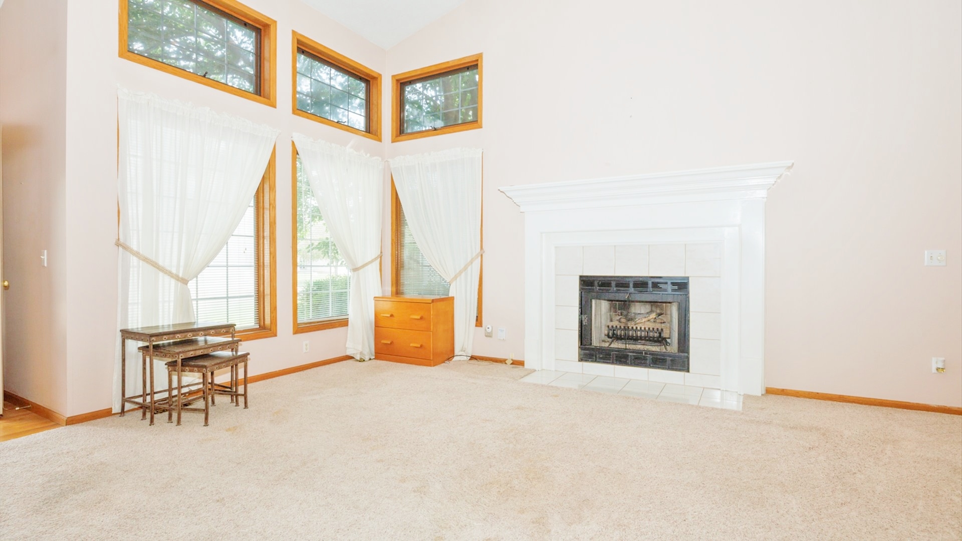 411 Wildberry Drive Normal, IL 61761 - Photo 9 of 51 an empty room with furniture and windows