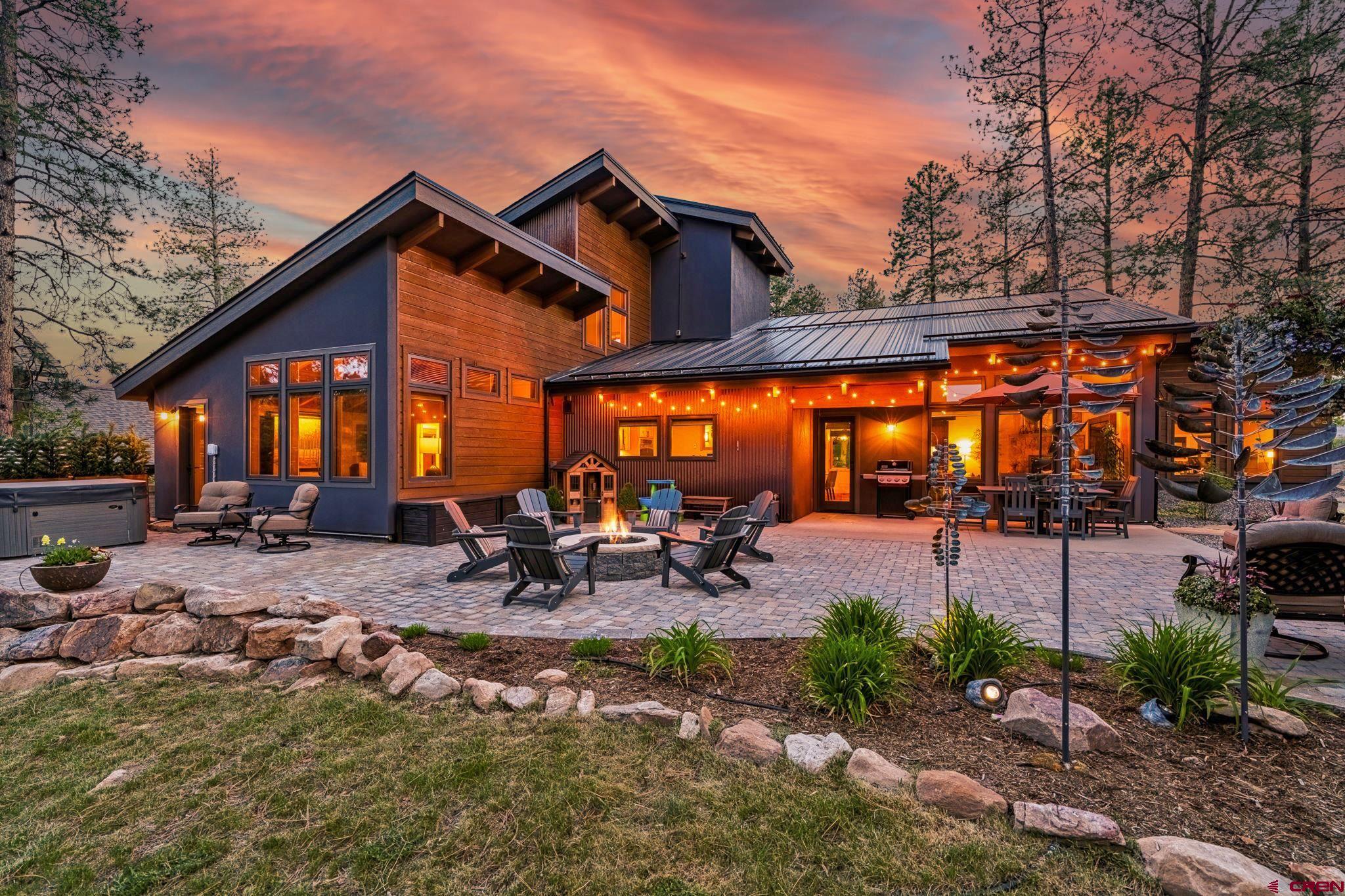 24 Monarch Crest Trail Durango, CO 81301 - Photo 16 of 45 a view of a backyard with a patio and outdoor seating