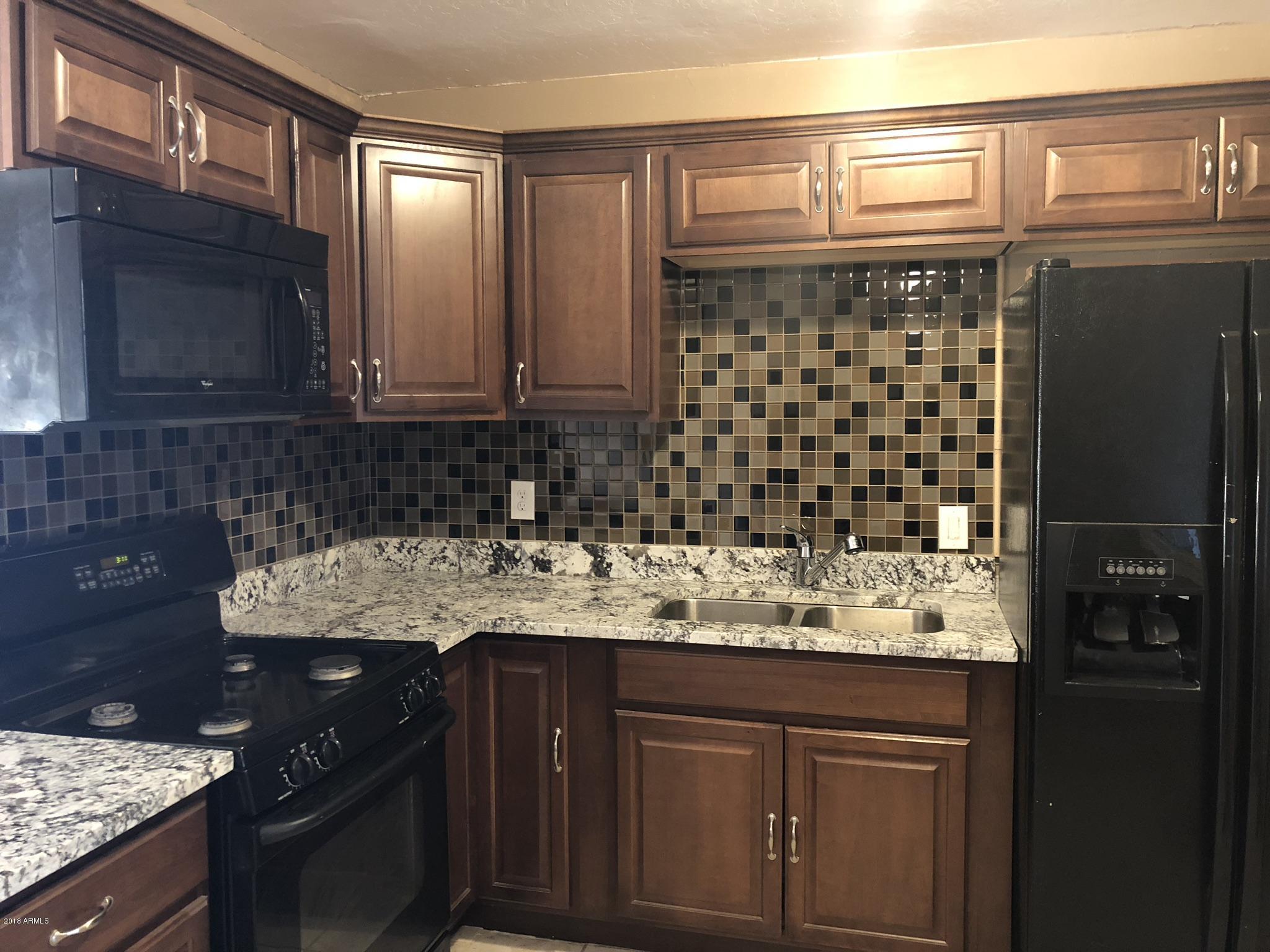 4140 West Alta Vista Road Phoenix, AZ 85041 - Photo 8 of 22 7B46D37D-69D8-4BDD-945C-36ACE6838C51