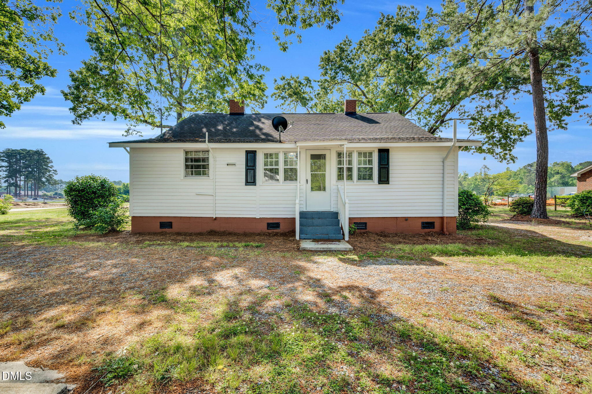 310 Chicopee Road Benson, NC 27504 - Photo 17 of 23 front view of a house with a yard