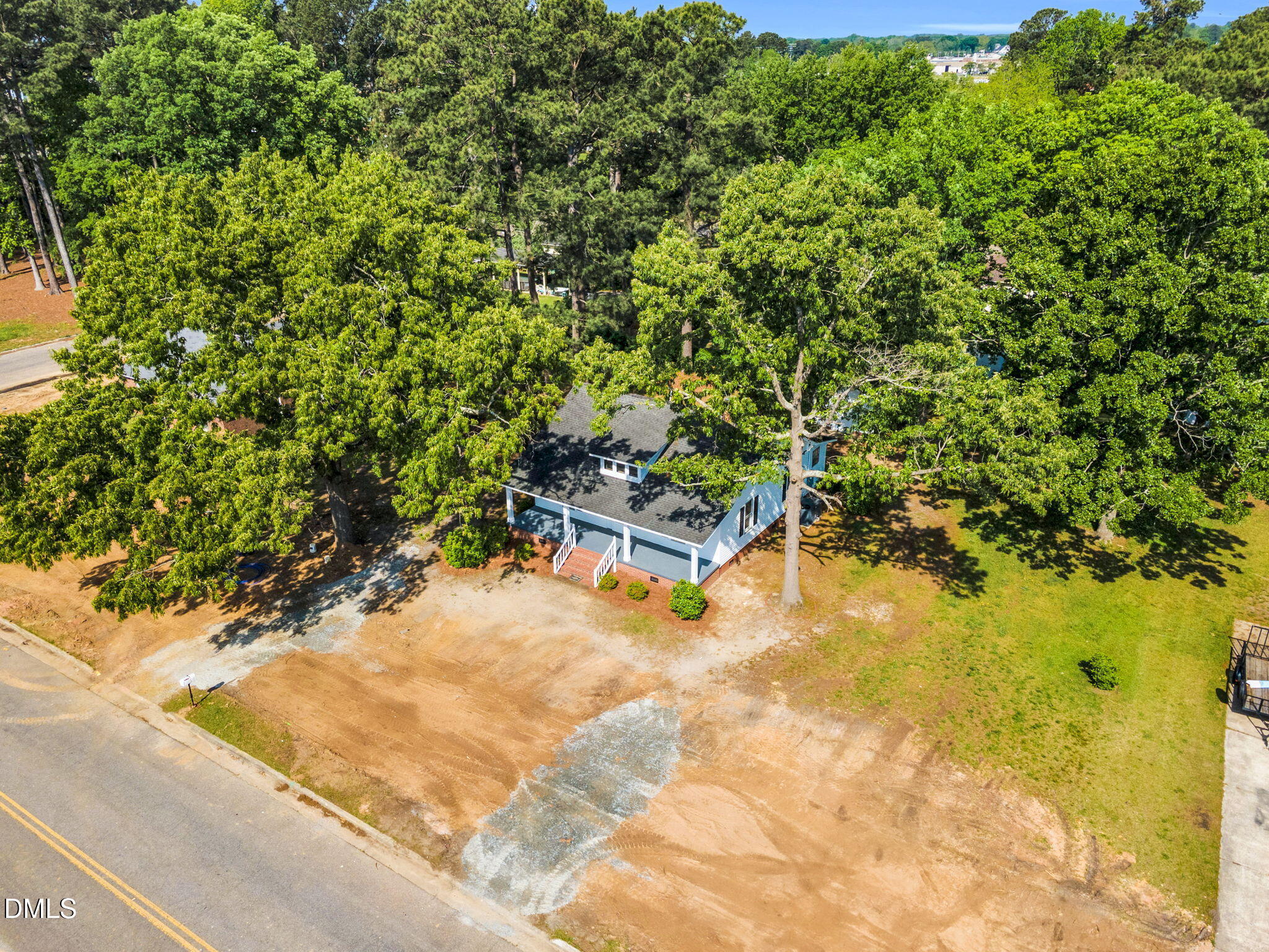 310 Chicopee Road Benson, NC 27504 - Photo 20 of 23 a swimming pool with some trees in the background