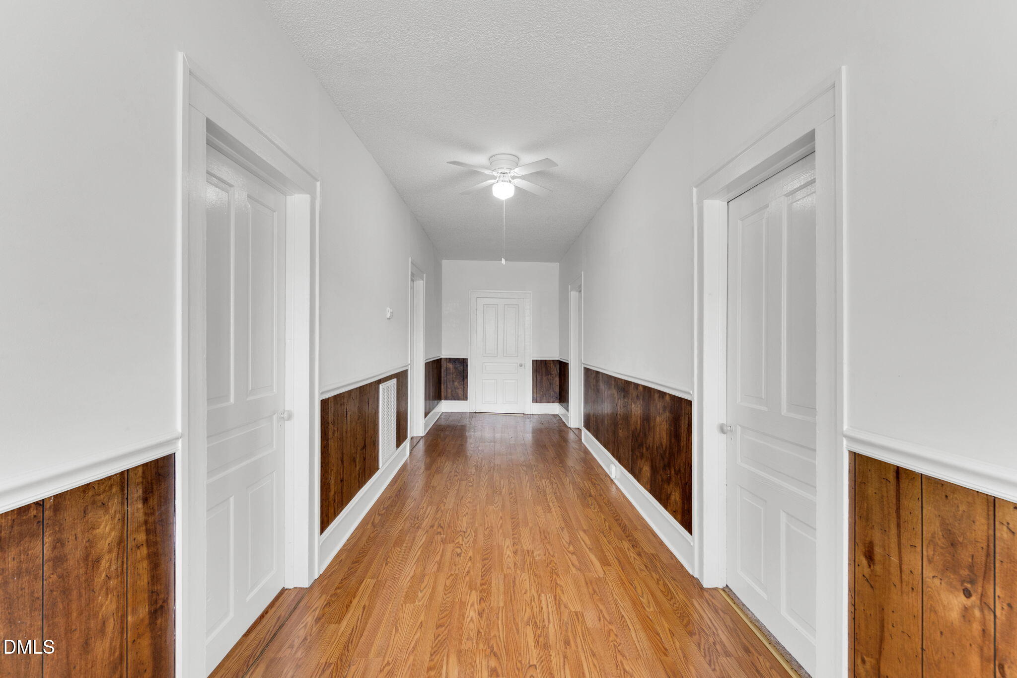310 Chicopee Road Benson, NC 27504 - Photo 4 of 23 a view of gallery with wooden floor