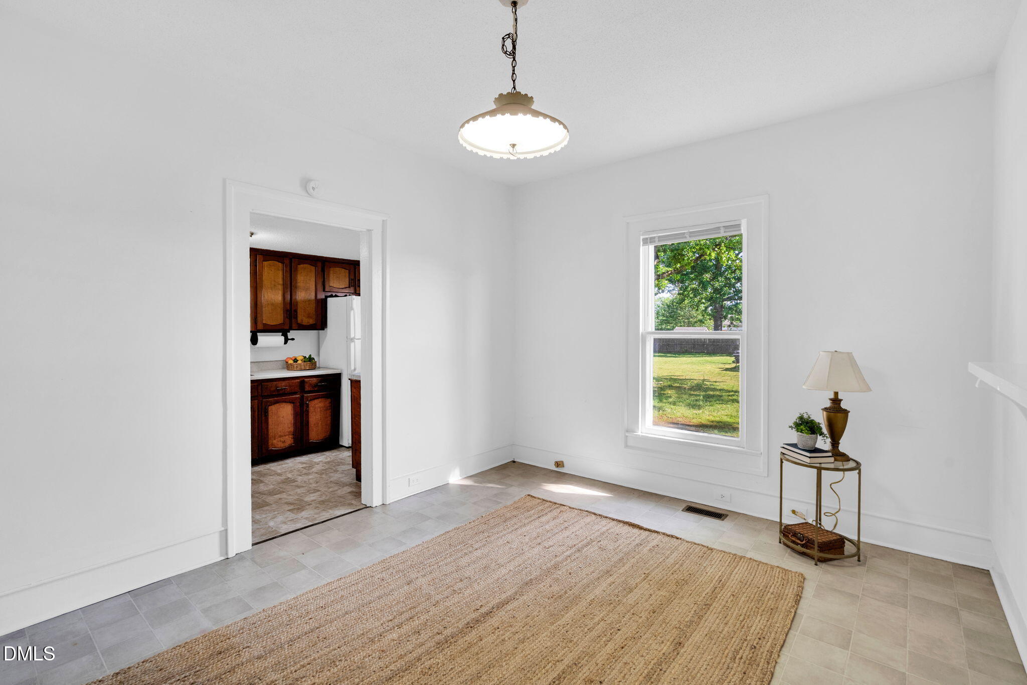 310 Chicopee Road Benson, NC 27504 - Photo 8 of 23 wooden floor in an empty room with a window