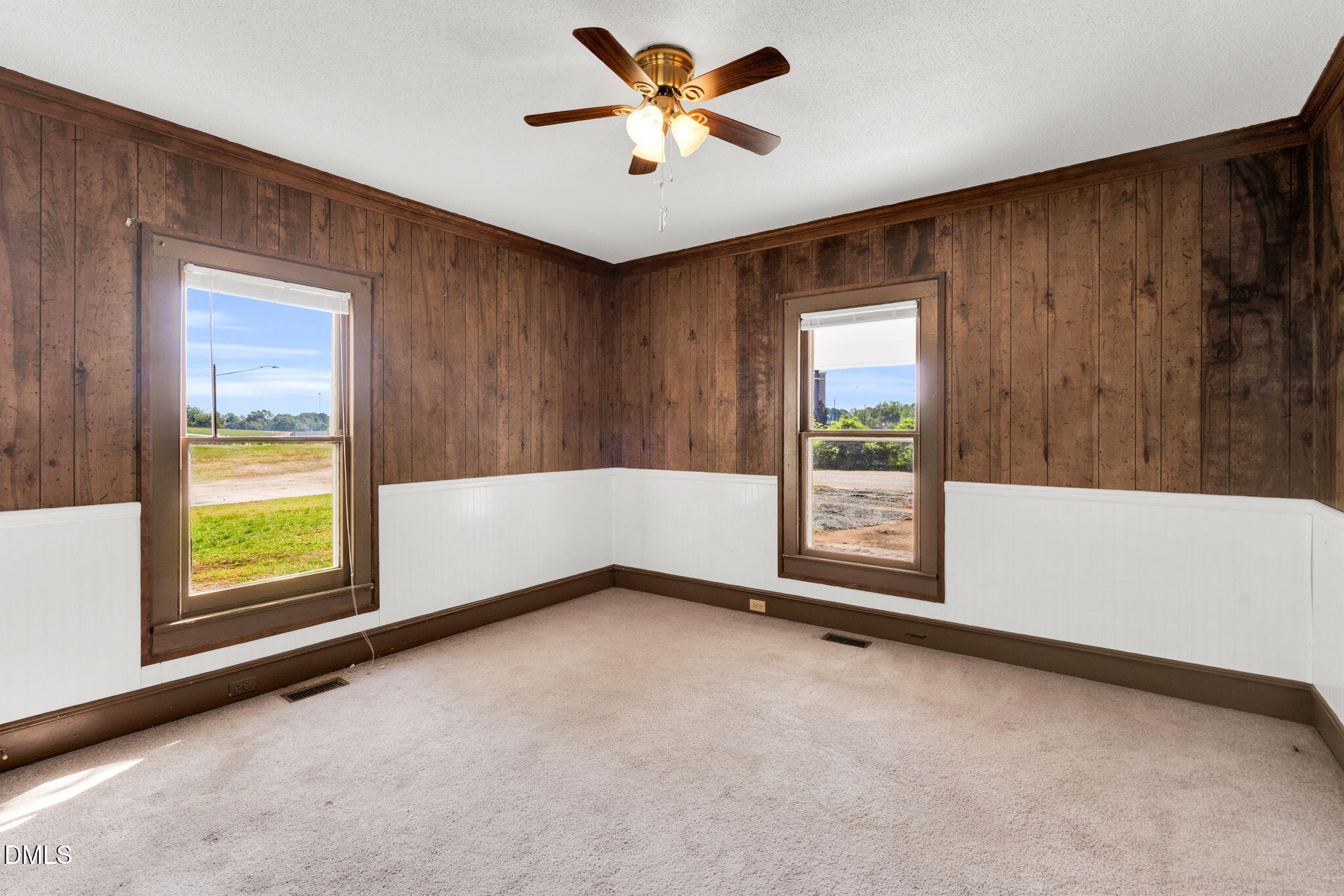 310 Chicopee Road Benson, NC 27504 - Photo 9 of 23 a view of an empty room with a window