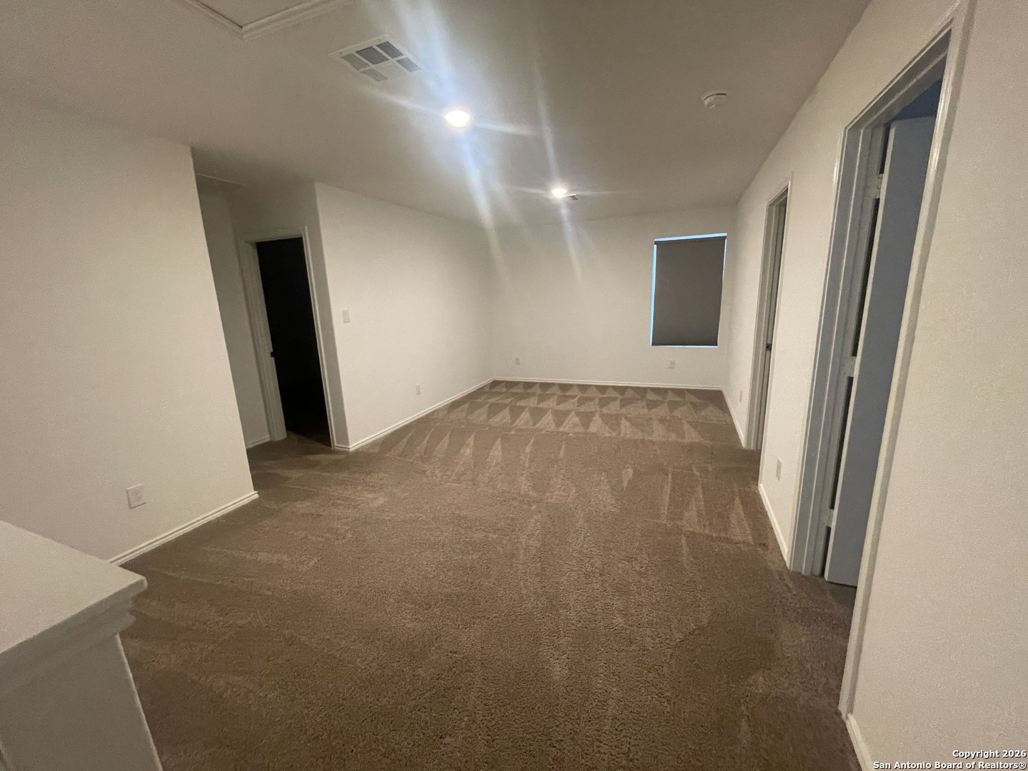 31885 Cherry Bulverde, TX 78163 - Photo 14 of 27 an empty room with windows