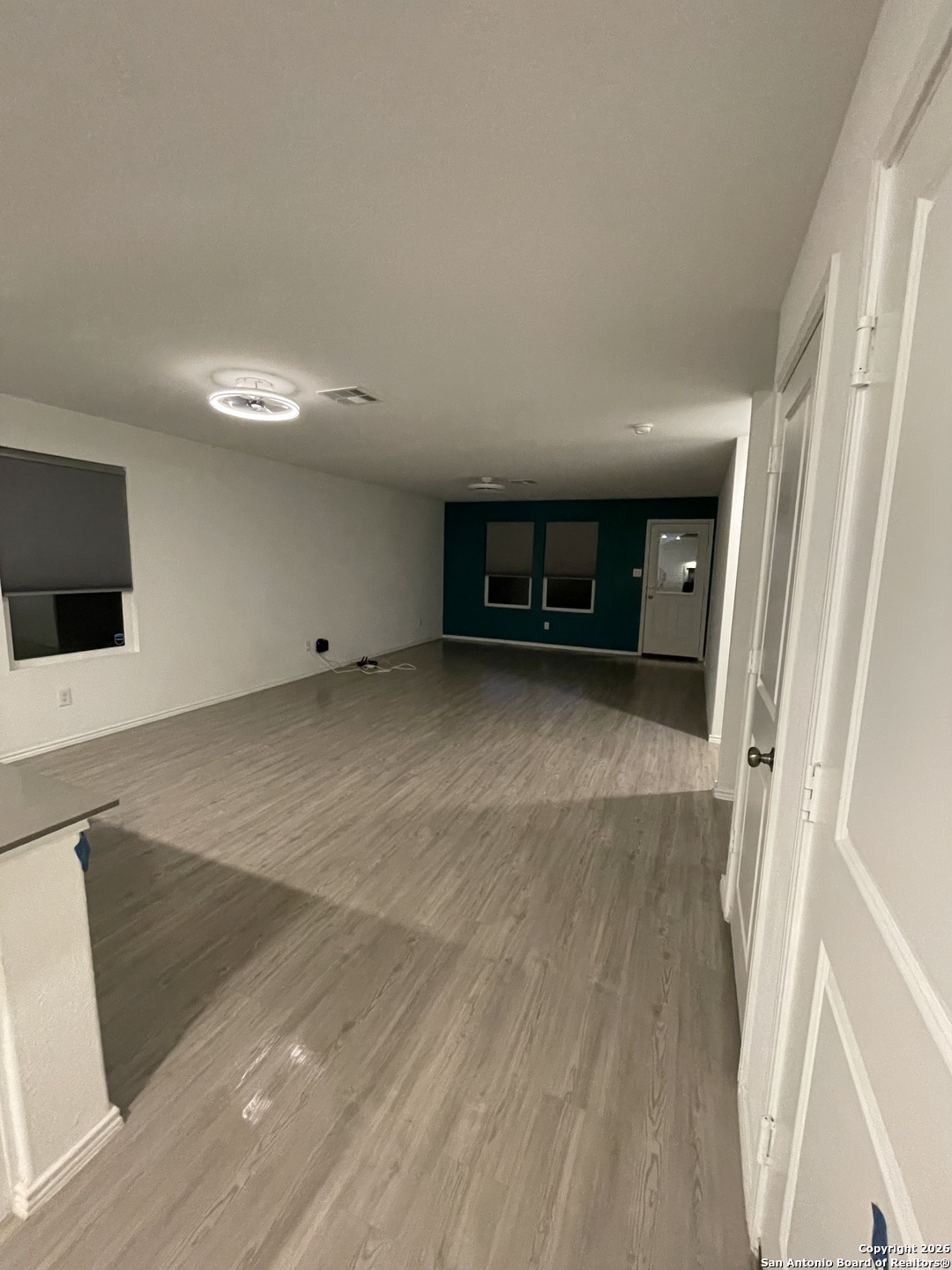 31885 Cherry Bulverde, TX 78163 - Photo 21 of 27 a view of an empty room with wooden floor