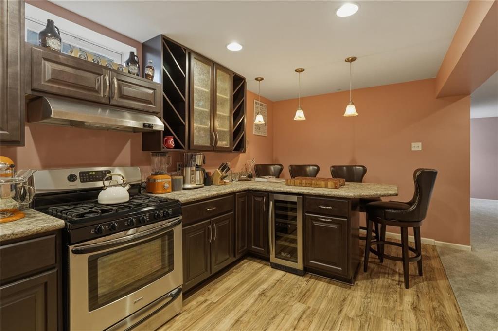 11621 Beacon Drive Irwin, PA 15642 - Photo 19 of 50 Game room, kitchen