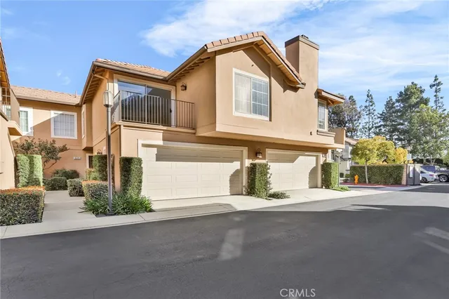 a view of a house with a street