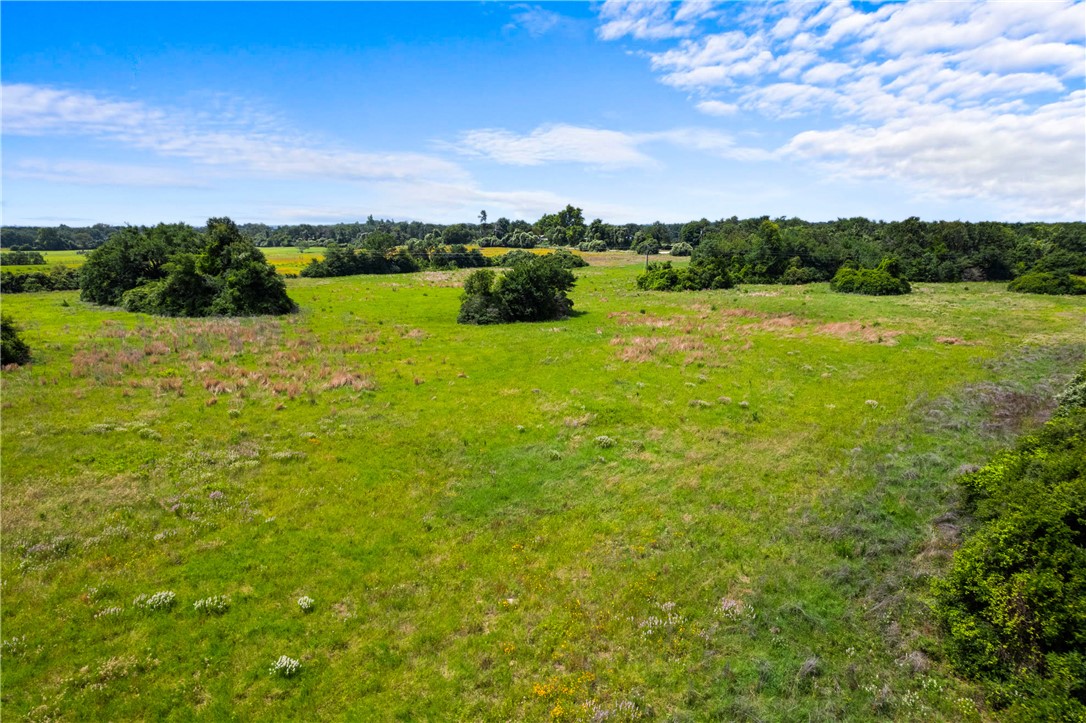 2874 Old Boone Prairie Road Franklin, TX 77856 - Photo 12 of 15 a view of a lake with houses in the background