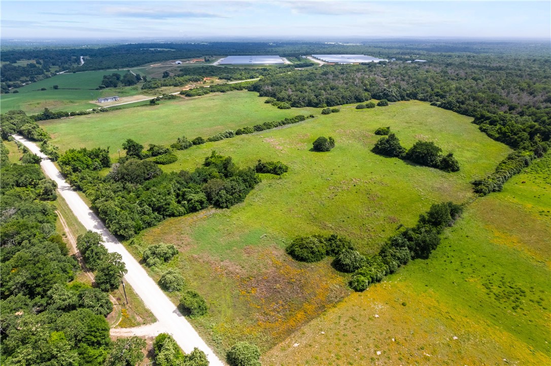 2874 Old Boone Prairie Road Franklin, TX 77856 - Photo 13 of 15 a view of a lake with a yard
