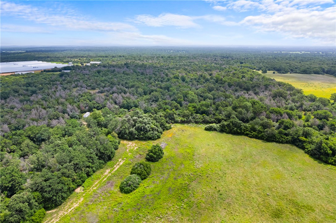 2874 Old Boone Prairie Road Franklin, TX 77856 - Photo 4 of 15 a view of a swimming pool and an outdoor seating