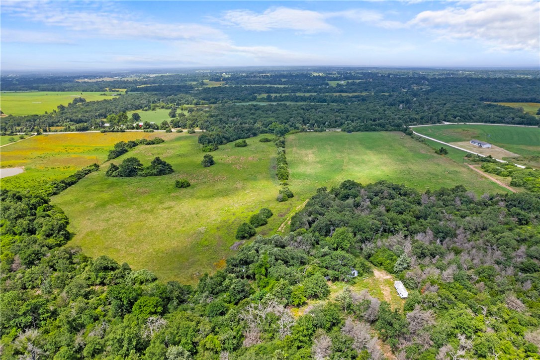 2874 Old Boone Prairie Road Franklin, TX 77856 - Photo 6 of 15 an aerial view of residential houses with outdoor space and swimming pool