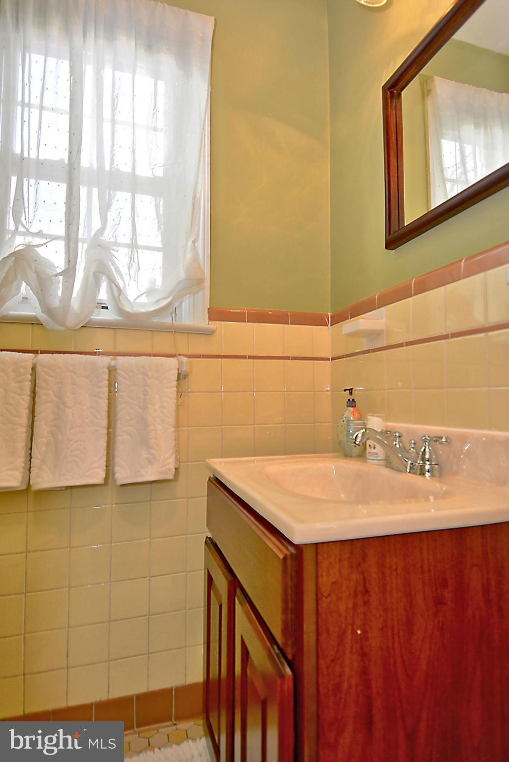102 East Indian Spring Drive Silver Spring, MD 20901 - Photo 15 of 30 Main floor powder room is great for guests.