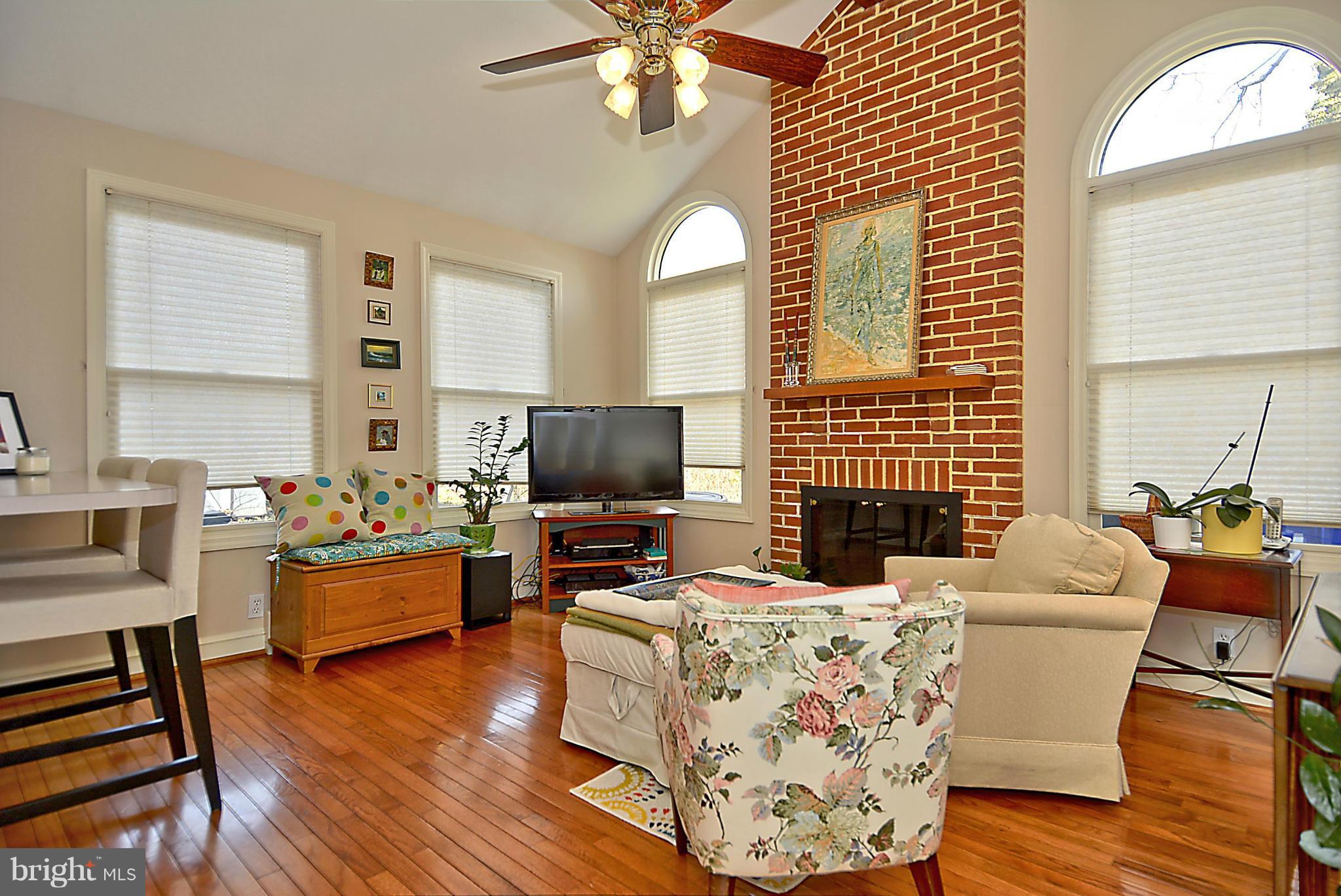 102 East Indian Spring Drive Silver Spring, MD 20901 - Photo 19 of 30 Beautiful floor to ceiling brick fireplace.