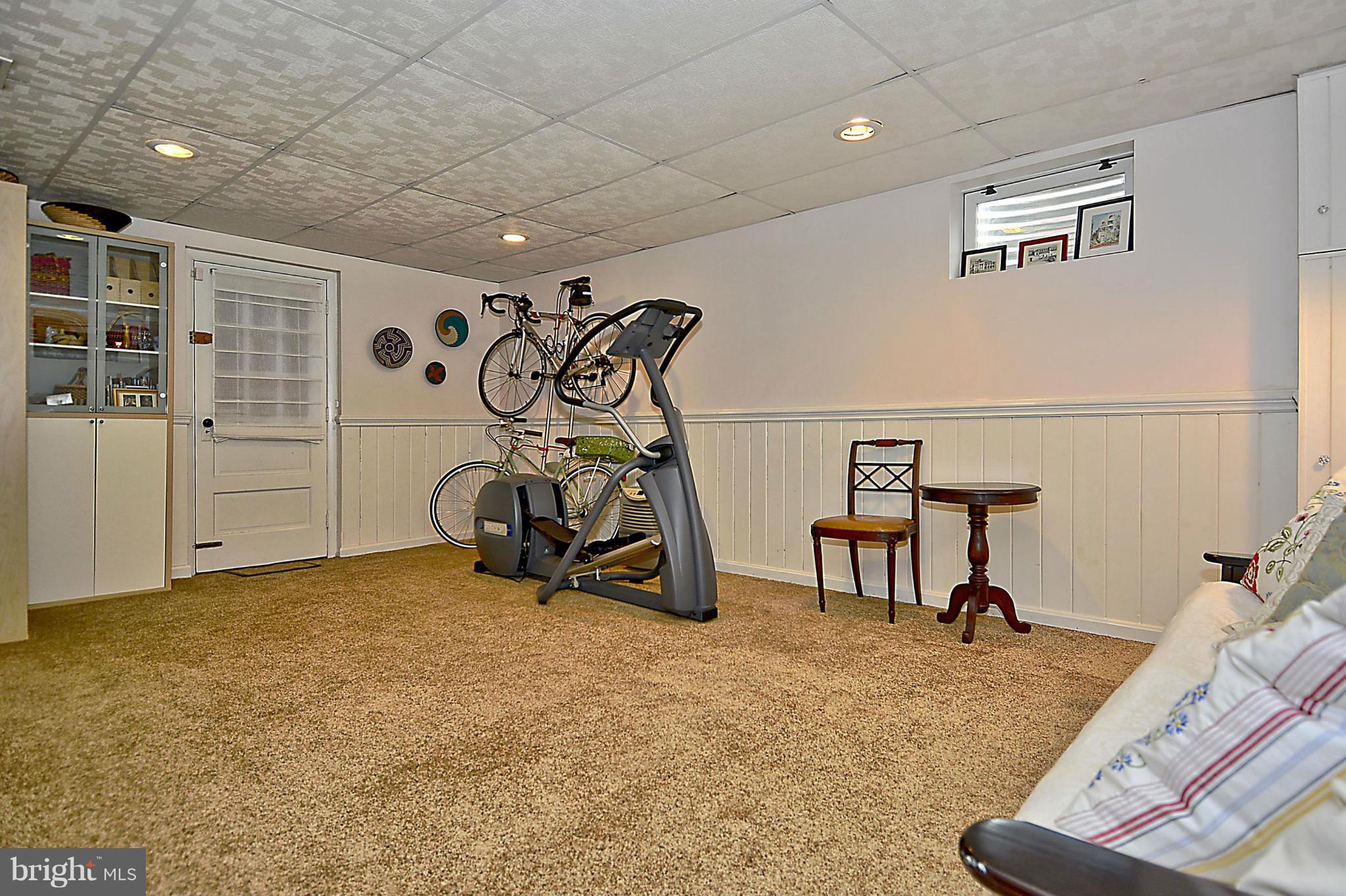 102 East Indian Spring Drive Silver Spring, MD 20901 - Photo 28 of 30 Basement rec room offers more entertaining space.