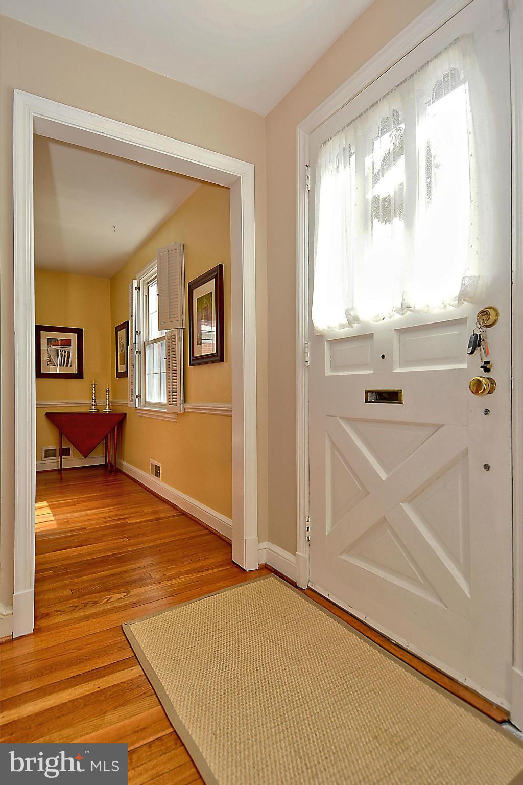 102 East Indian Spring Drive Silver Spring, MD 20901 - Photo 6 of 30 Home enters on main level with hardwood floors.