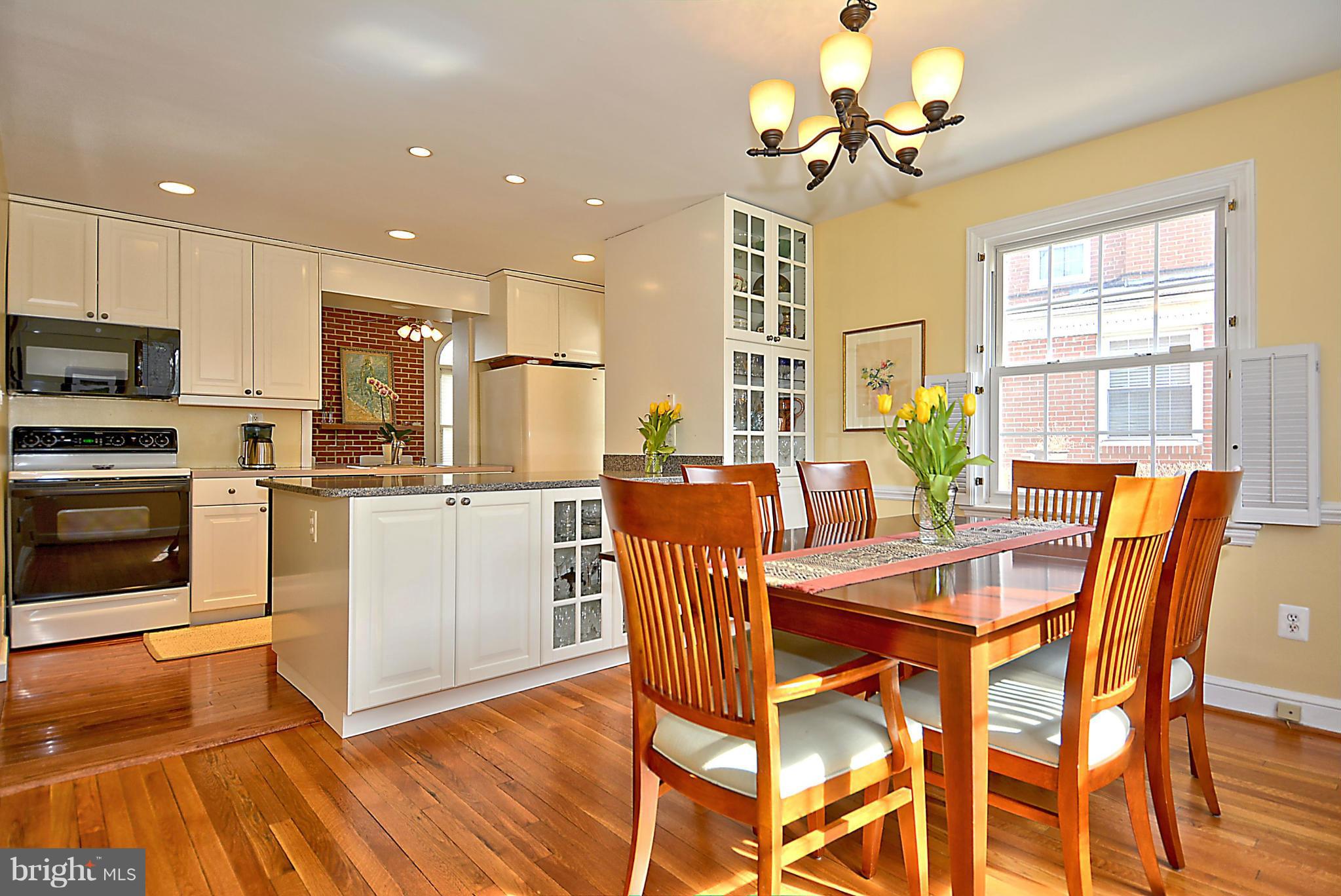 102 East Indian Spring Drive Silver Spring, MD 20901 - Photo 8 of 30 Dining room opens to spacious kitchen.