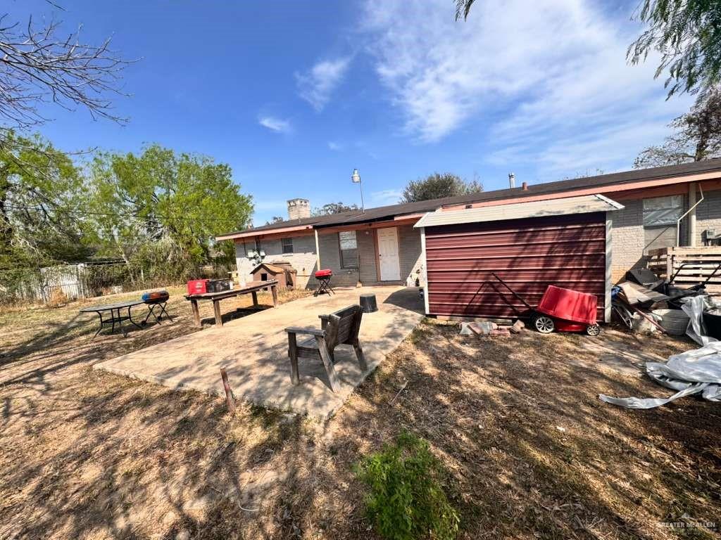 421 South Main Street Donna, TX 78537 - Photo 19 of 24 a view of a car park in front of house