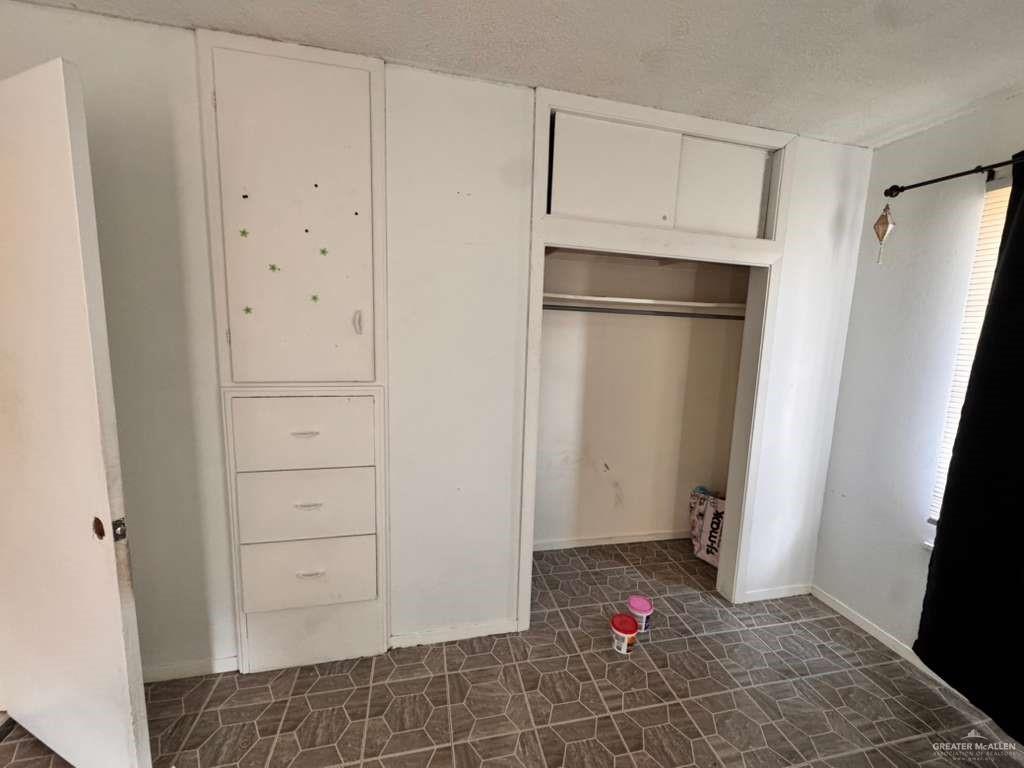 421 South Main Street Donna, TX 78537 - Photo 6 of 24 a room with storage and utility