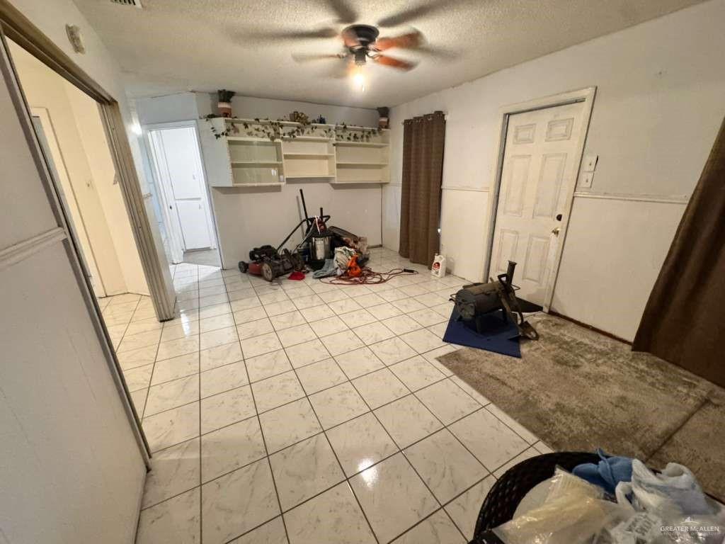 421 South Main Street Donna, TX 78537 - Photo 9 of 24 a view of a room with gym equipment