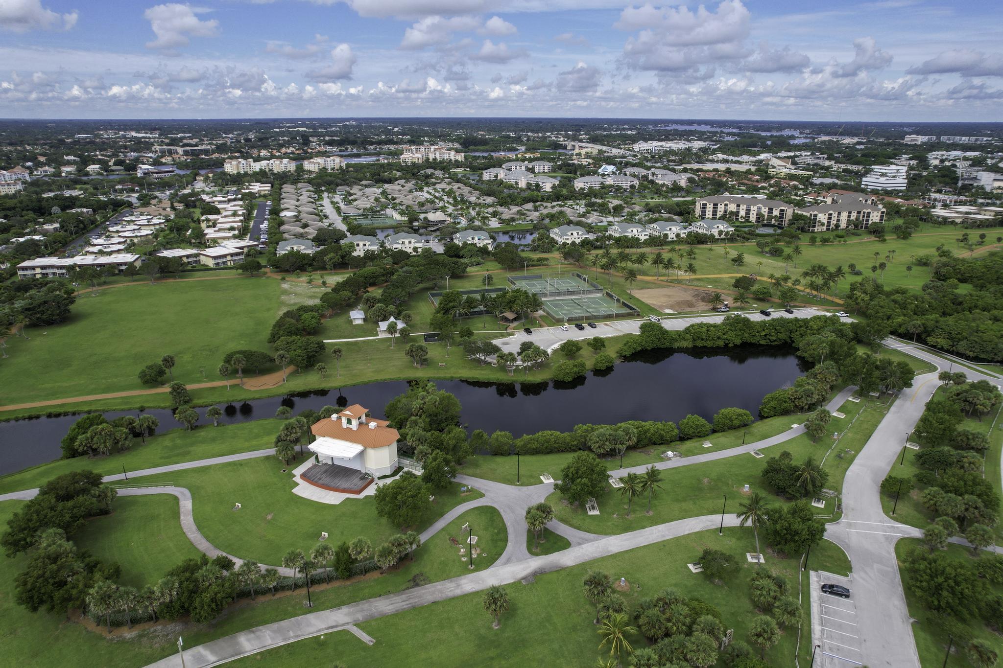 1605 Highway 1, Unit F204 Jupiter, FL 33477 - Photo 19 of 33 an aerial view of a residential houses with outdoor space and outdoor seating