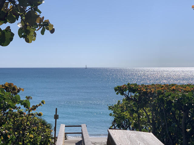 1605 Highway 1, Unit F204 Jupiter, FL 33477 - Photo 27 of 33 a view of a lake with a mountain