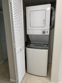 1605 Highway 1, Unit F204 Jupiter, FL 33477 - Photo 9 of 33 a close up view of washer and dryer