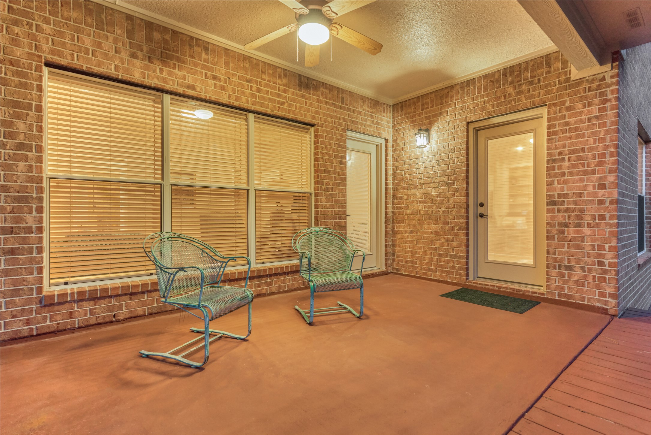 197 Monterrey Road East Montgomery, TX 77356 - Photo 36 of 50 A covered porch to enjoy quiet time and panoramic golf views that you just can't get enough of.