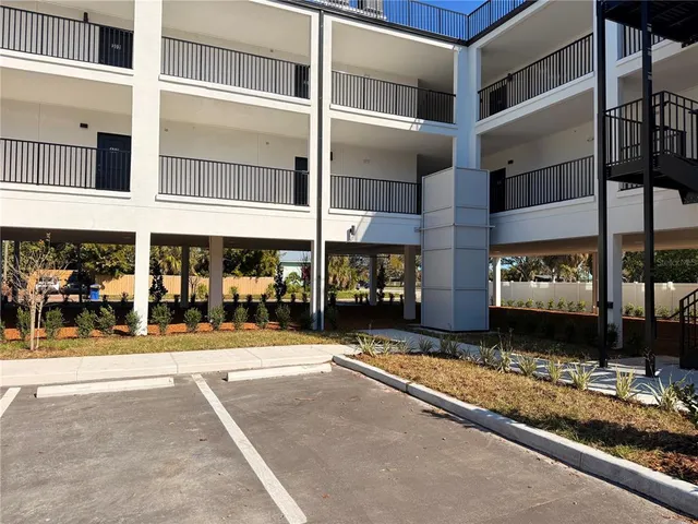 a view of a building with a street