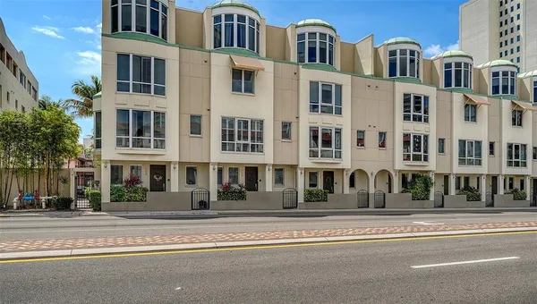 a front view of multi story residential apartment building