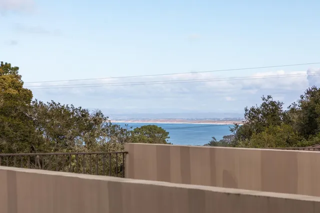 a bathroom with a toilet a sink and a mirror