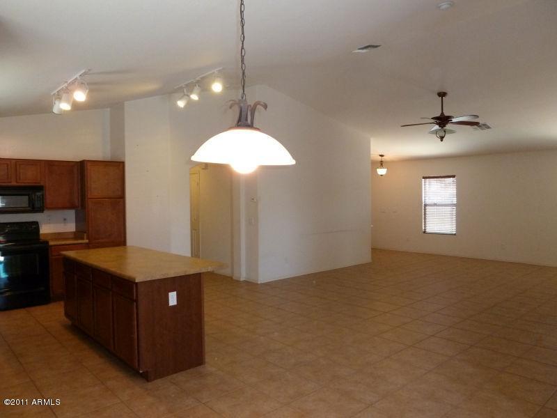 17829 West Redfield Road Surprise, AZ 85388 - Photo 6 of 21 dining to family room