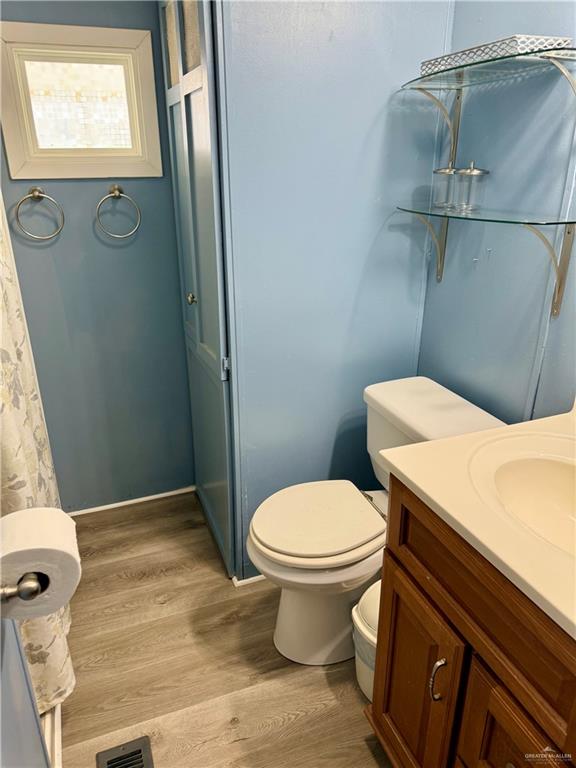 492 West Clam Circle Port Isabel, TX 78578 - Photo 4 of 8 a bathroom with a sink and toilet