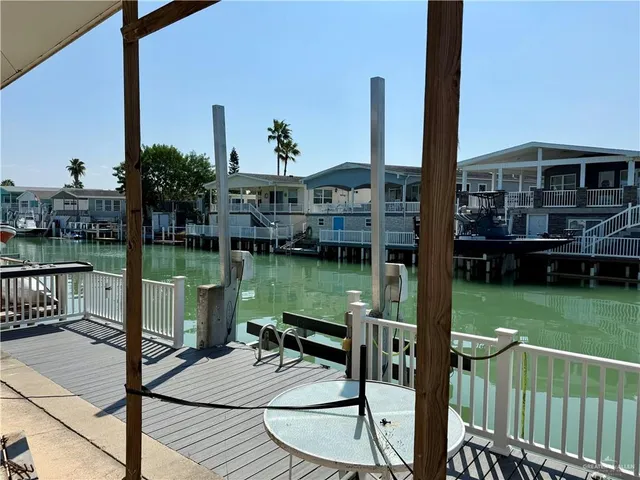 a view of a lake from a porch