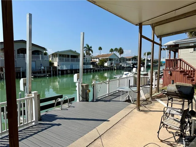 a view of a lake from a balcony