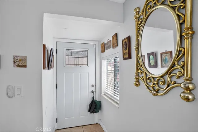 a view of water heater room with windows