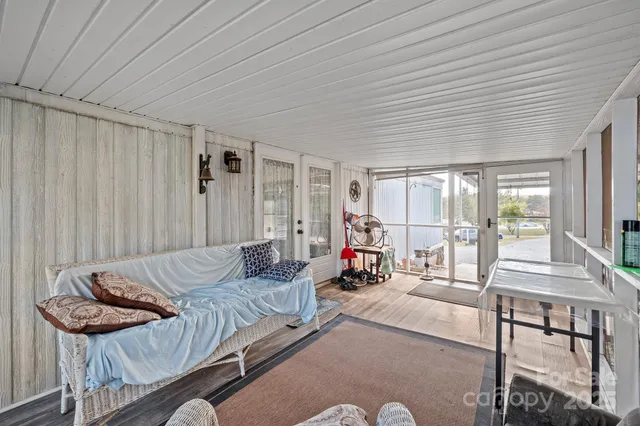 a view of a garage with parked cars