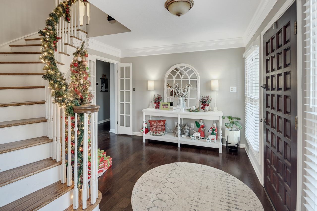 455 Burley Road Collierville, TN 38017 - Photo 2 of 25 a living room with furniture and a flat screen tv