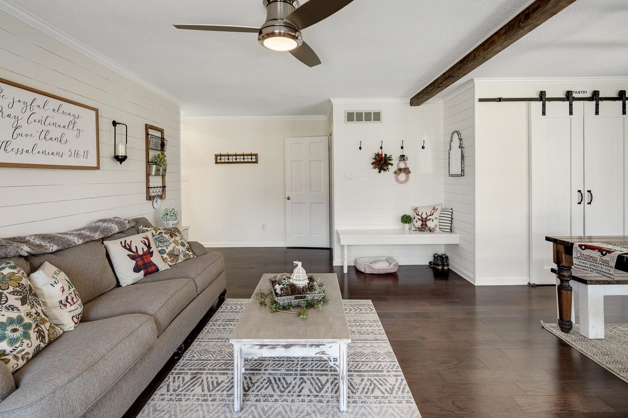 455 Burley Road Collierville, TN 38017 - Photo 12 of 25 a living room with furniture or couch and a wooden floor