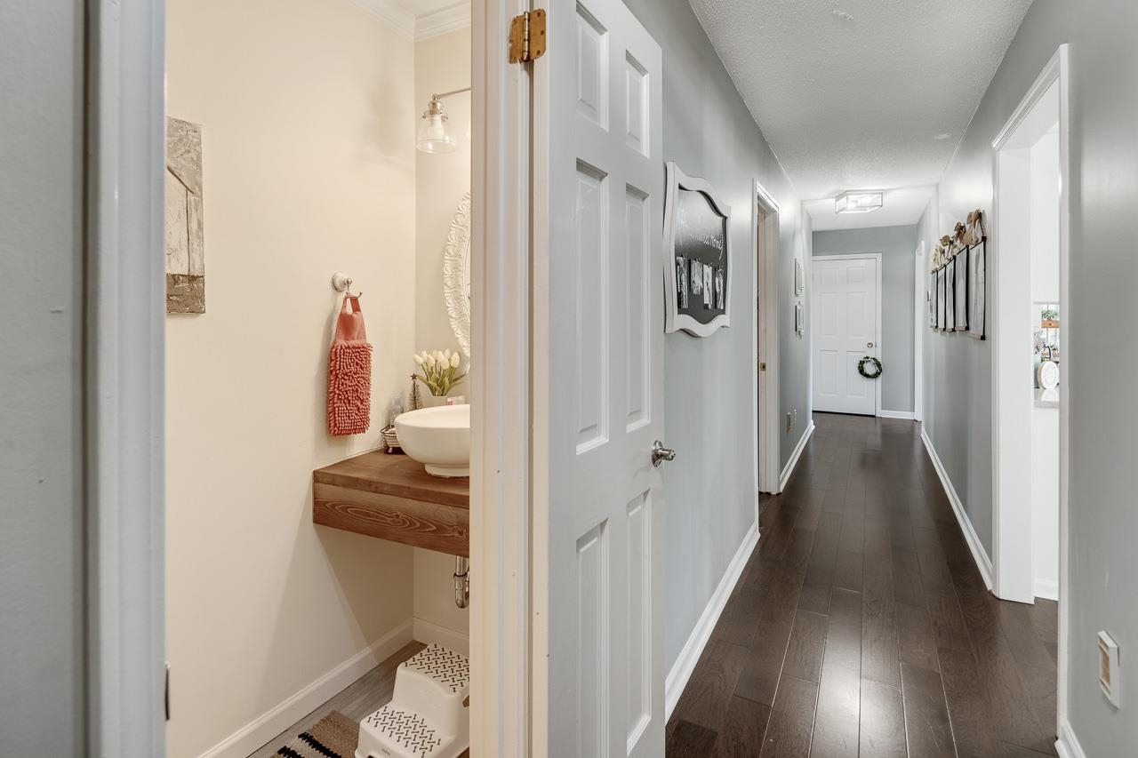 455 Burley Road Collierville, TN 38017 - Photo 14 of 25 a view of a hallway with wooden floor and space