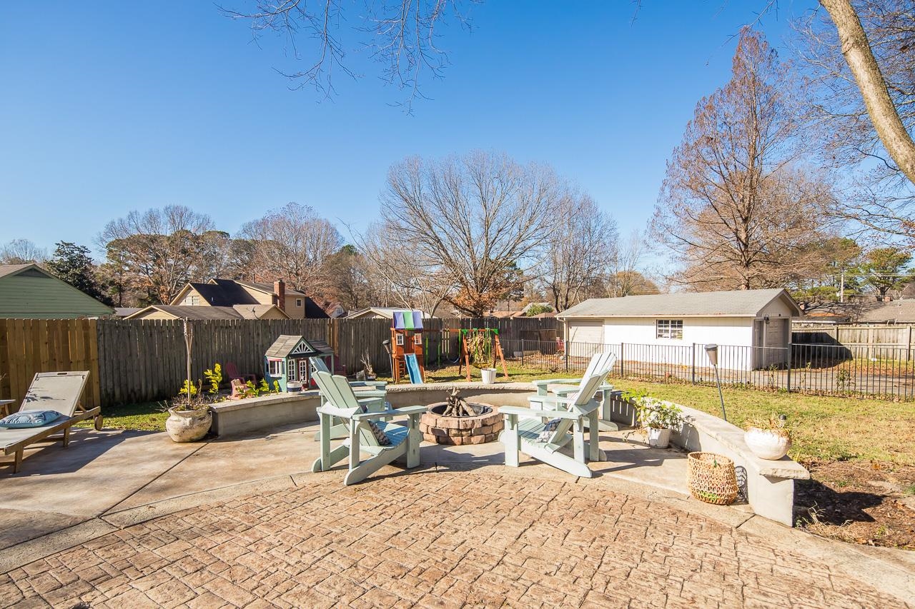 455 Burley Road Collierville, TN 38017 - Photo 25 of 25 a view of a backyard with a patio