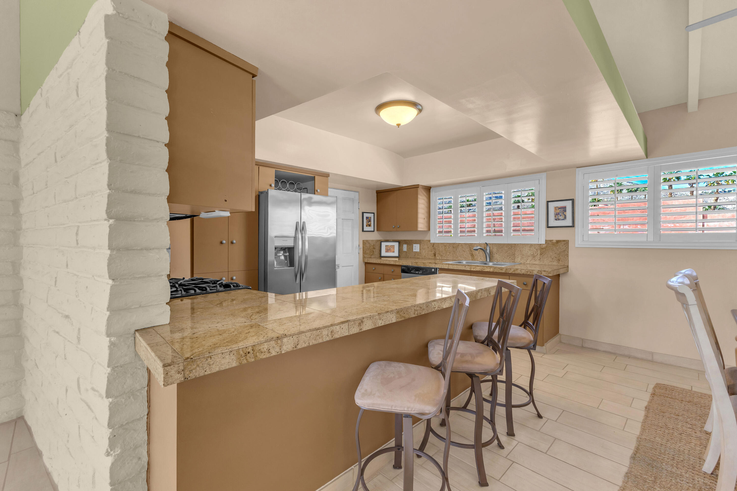 69850 Highway 111, Unit 252 Rancho Mirage, CA 92270 - Photo 13 of 57 Have a seat and chat with the chef!