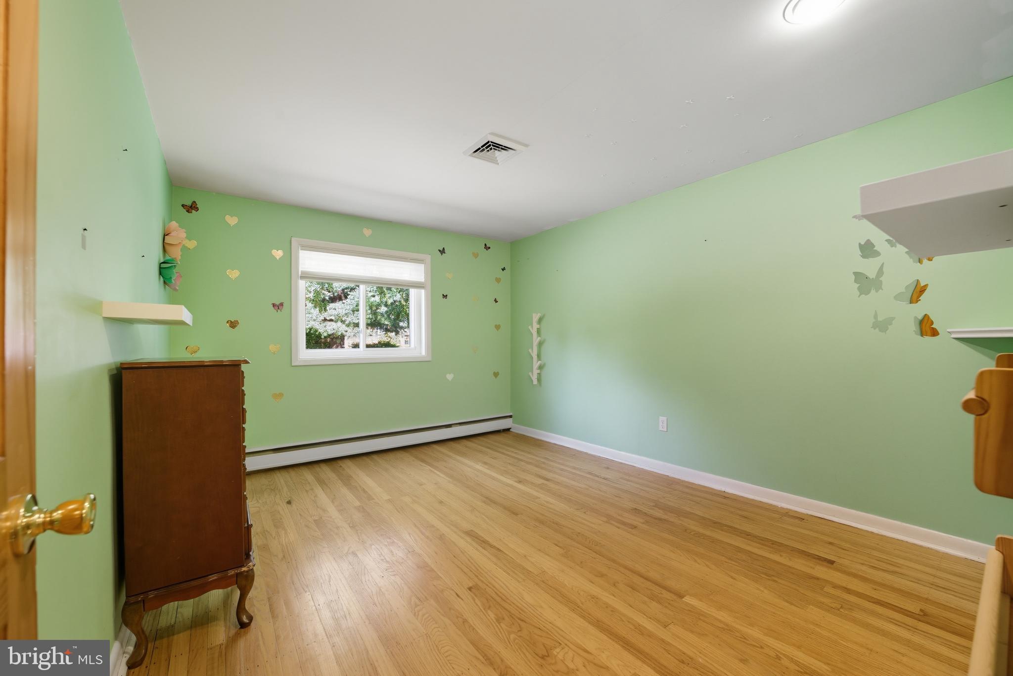 328 Conestoga Road Devon, PA 19333 - Photo 21 of 35 a view of a big room with wooden floor and windows