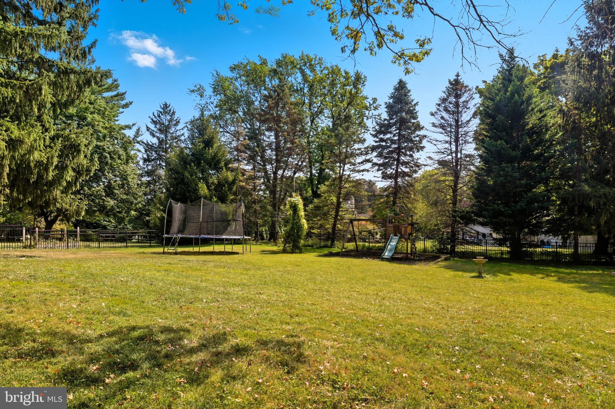 328 Conestoga Road Devon, PA 19333 - Photo 35 of 35 a view of a swimming pool with an outdoor space and seating area