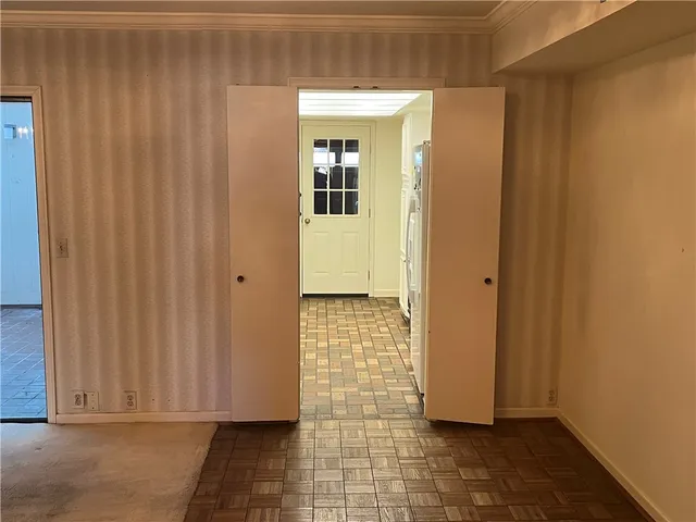 a kitchen with a stove and a microwave