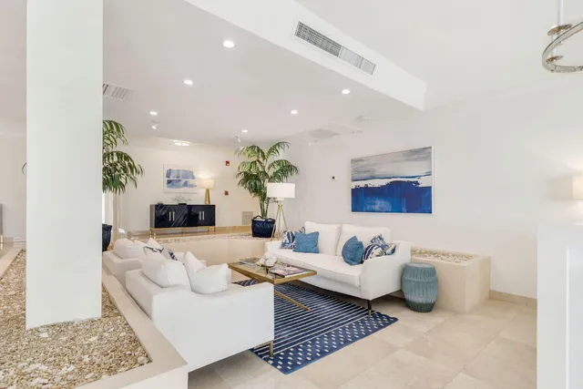 a living room with furniture and a couch