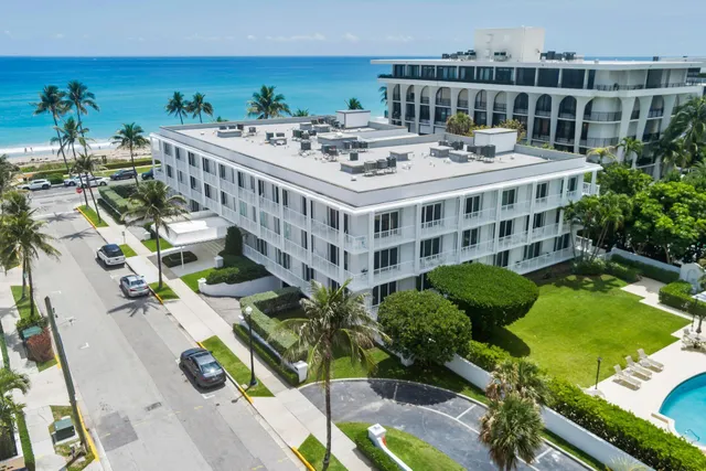 a view of a chairs and table in patio