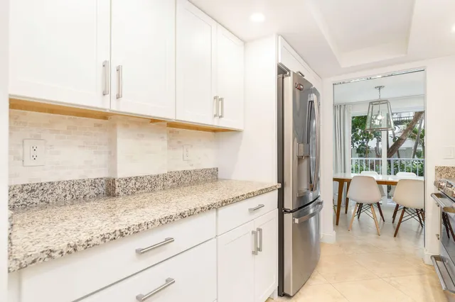 a view white cabinets and outdoor space