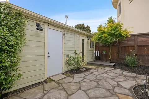 a view of a house with a small yard