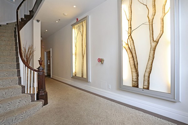 32 Rutland Street, Unit 2L Boston, MA 02118 - Photo 21 of 22 a view of a hallway with windows
